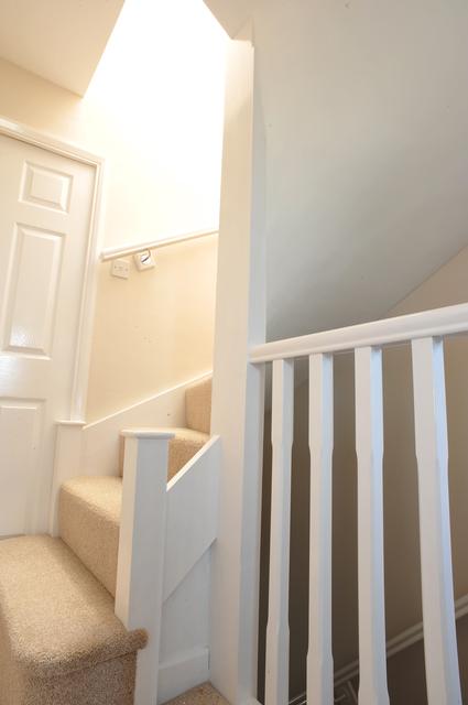 bull nose step and stub newel finish stairs for loft conversions off well with stub newel with velux letting light down on stairs 
